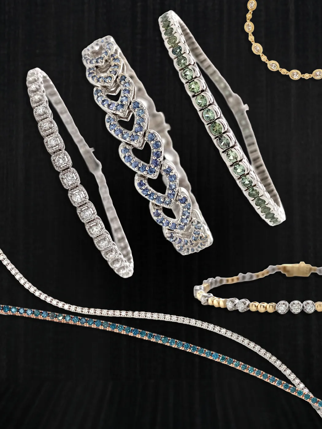 Elegant bracelets with various gemstones on a black background.