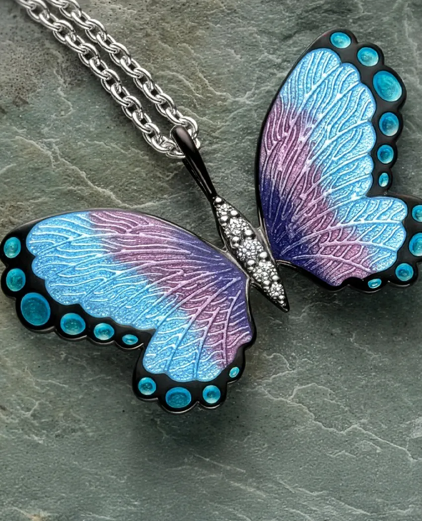 Colorful butterfly pendant necklace with intricate detailing, inviting you to explore more jewelry at Golden Gifts Jewelry.