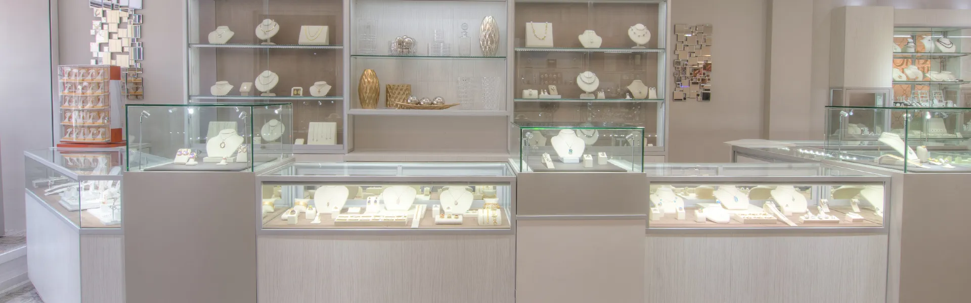 Inside of Harmony Jewellers showcasing necklaces, bracelets, earrings and other jewellery in Grimsby, On