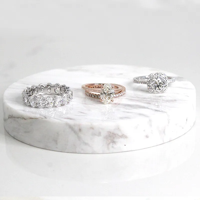 Oval cut eternity band, rose gold oval cut engagement ring and white gold diamond halo engagement ring