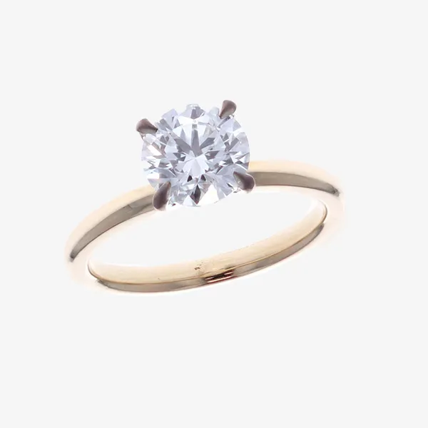 Rose gold oval cut diamond engagement ring and diamond wedding band set