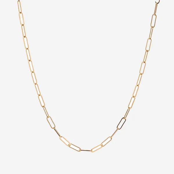 A yellow gold thick link chain on grey brackgound