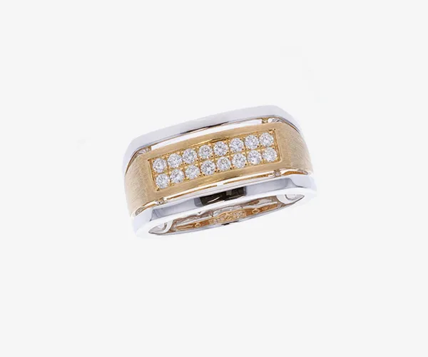A yellow gold and diamond mens ring on grey brackgound