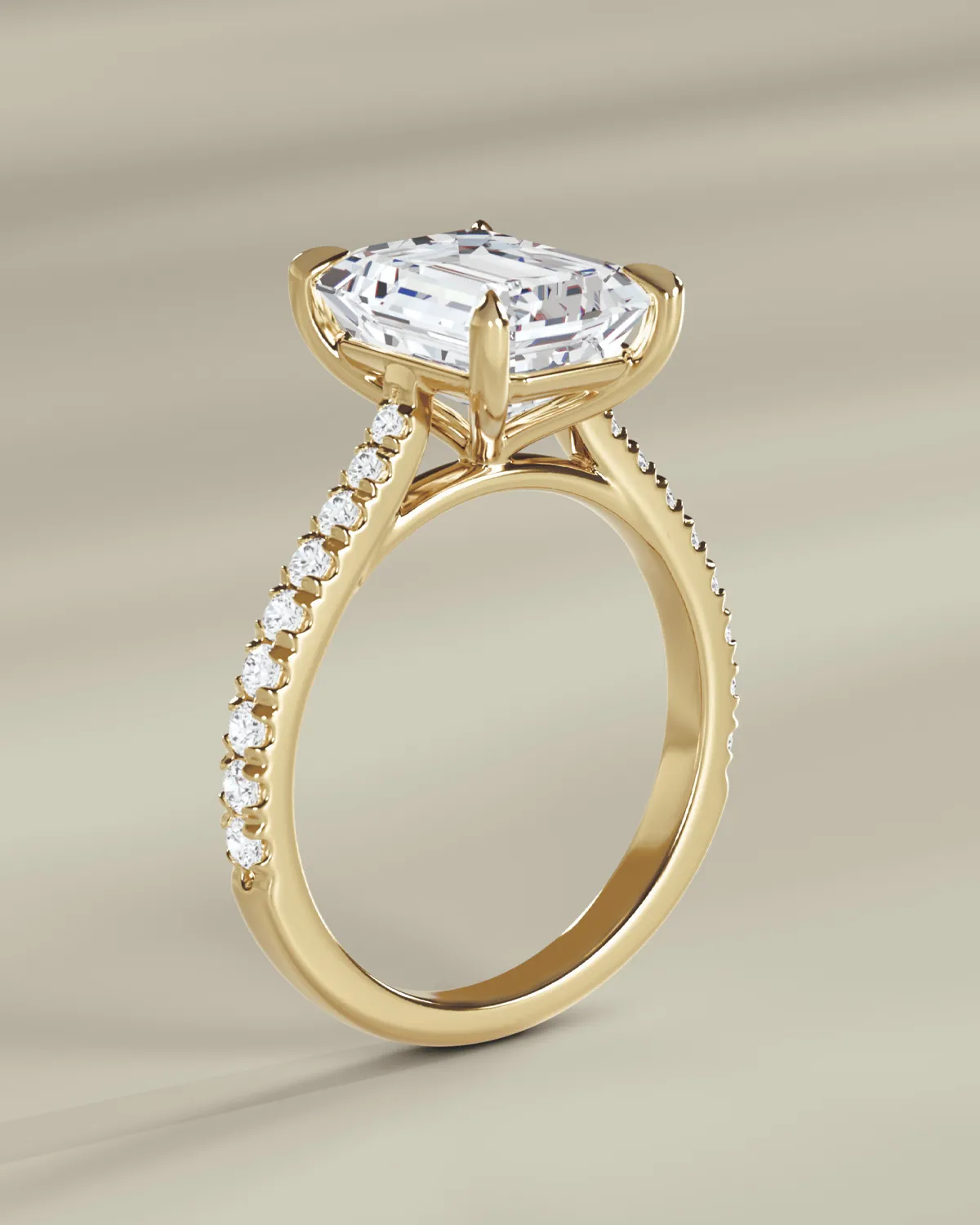 Gold engagement ring with a large diamond and smaller diamonds on the band.