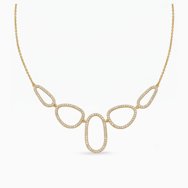 Gold necklace with five diamond-studded, irregular oval links.