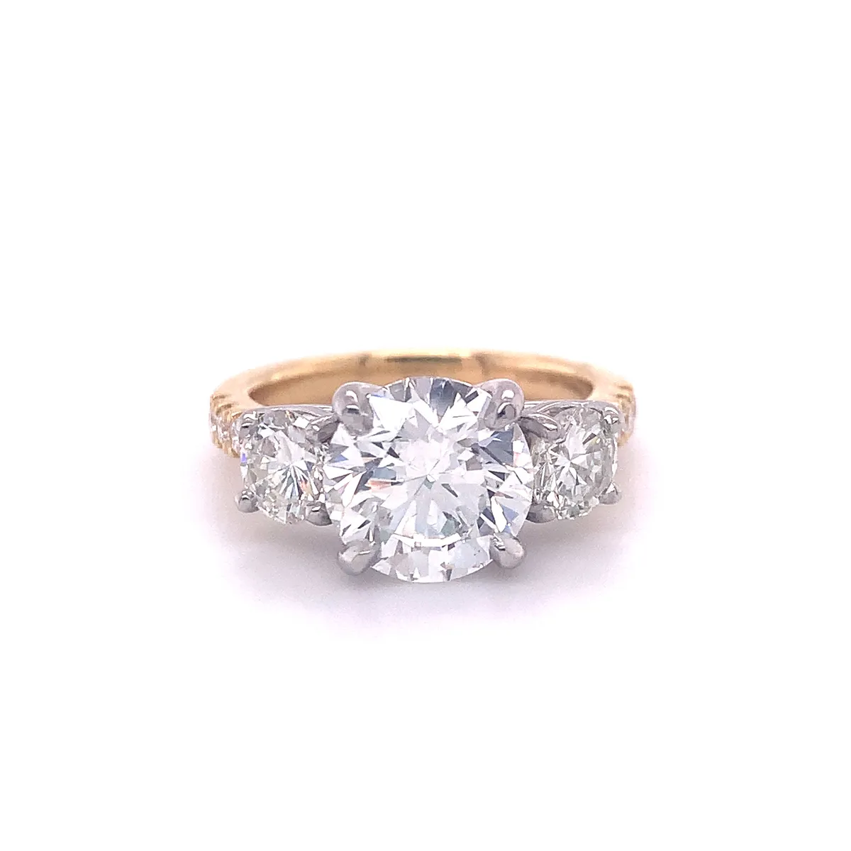 Three-Stone Ring Created Using Unworn Studs