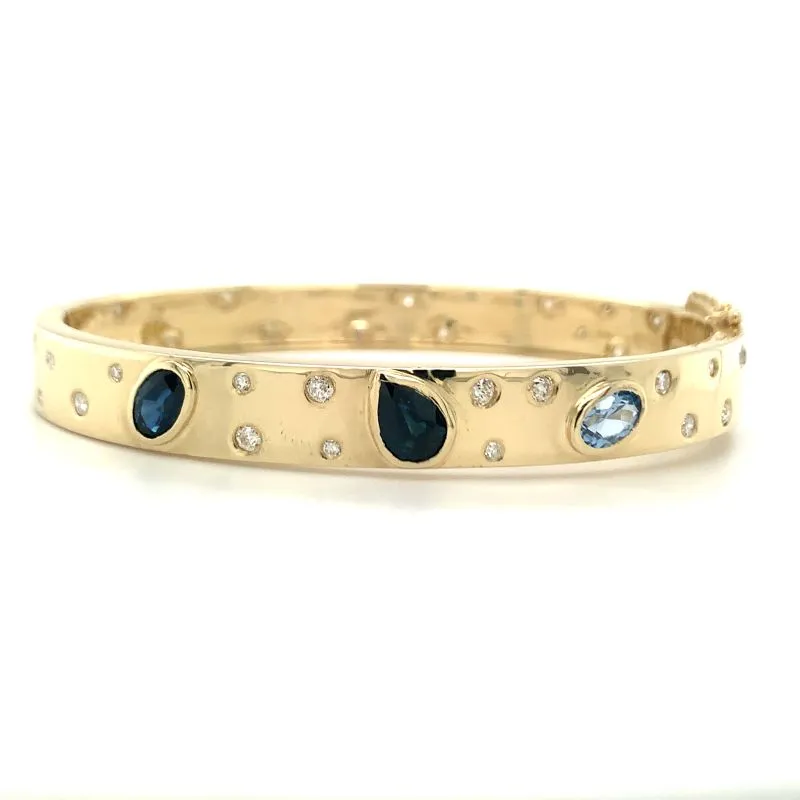 Dozens of Stones, Old Gold Used to Create Bangle & Pendant