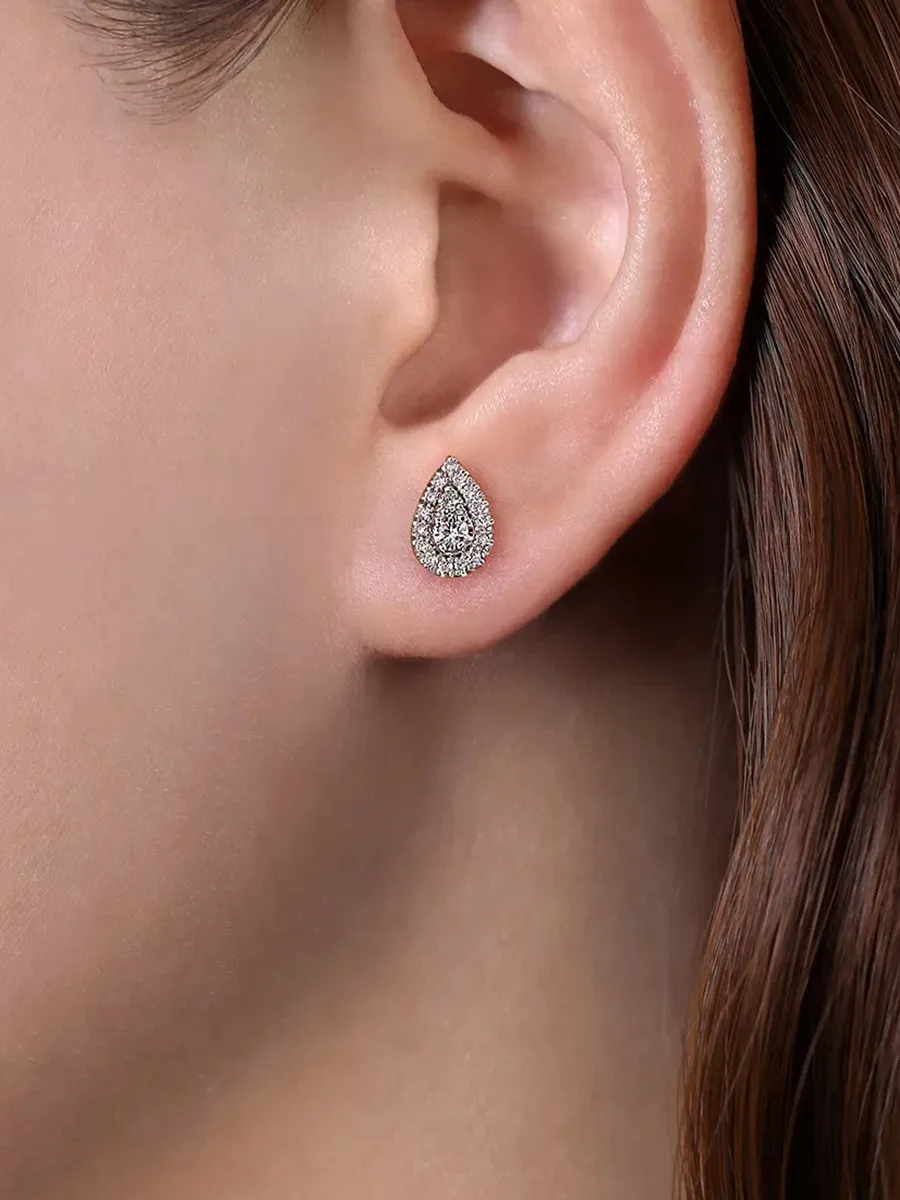 Lab-grown diamond earrings on ear, available at Hingham Jewelers. Shop now.