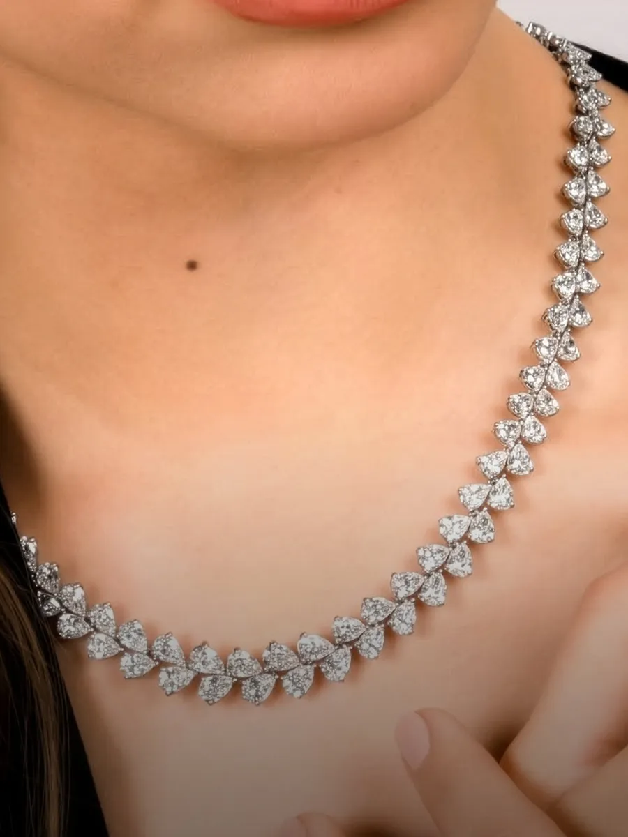 Lab grown diamond necklace worn on a neck. Shop at Hingham Jewelers.