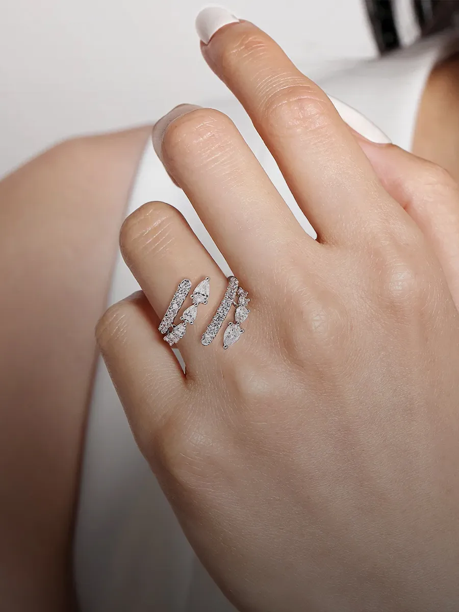Gold ring with multiple sparkling diamonds in various sizes. Shop lab grown diamond rings at Hingham Jewelers South Shore MA.