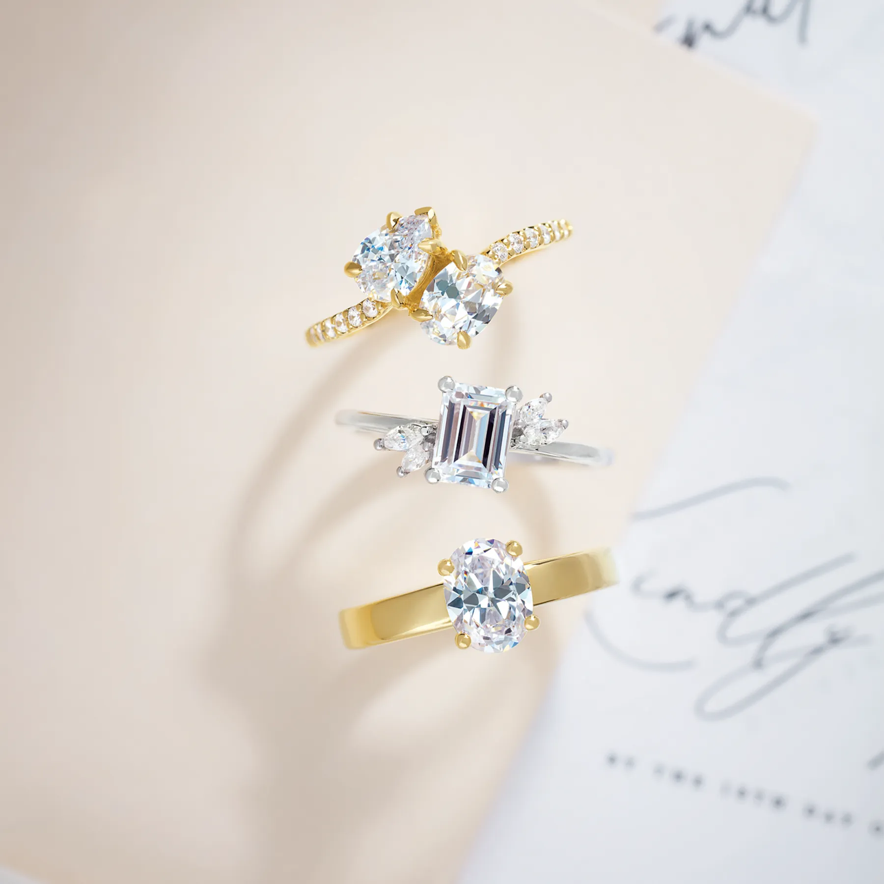 Elegant diamond engagement ring with a round center stone and halo, set on a twisted band.