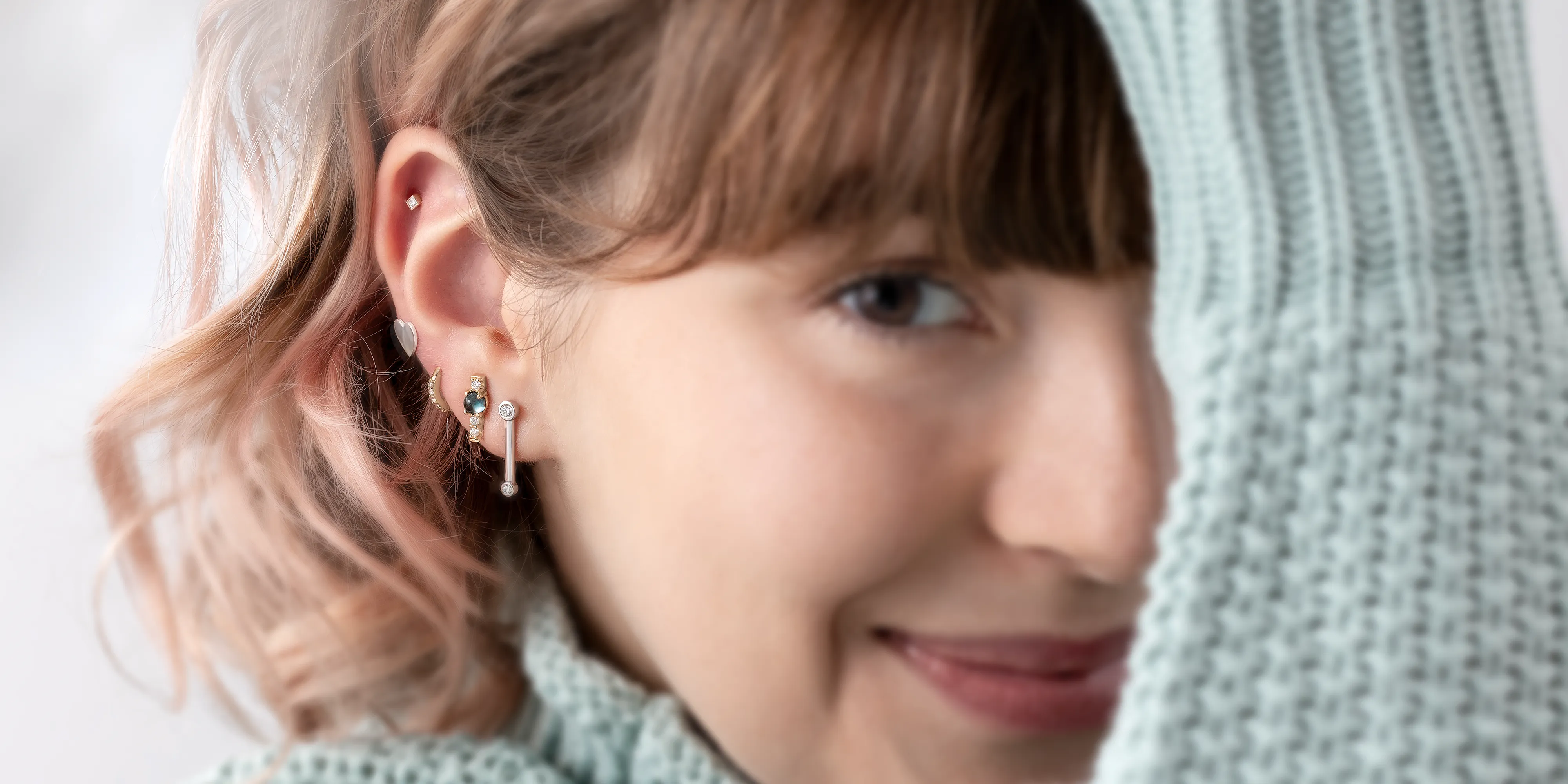 Elegant hands adorned with a diamond bracelet and rings, showcasing fine jewelry.