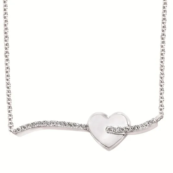 Silver heart necklace with a sparkling chain, perfect for a romantic gift. Visit Holly McHone Jewelers in Astoria.