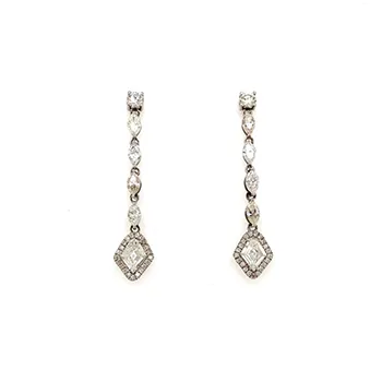 Fancy kite-inspired earrings featuring sparkling diamonds