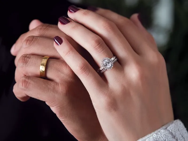 Elegant hand showcasing dazzling engagement ring