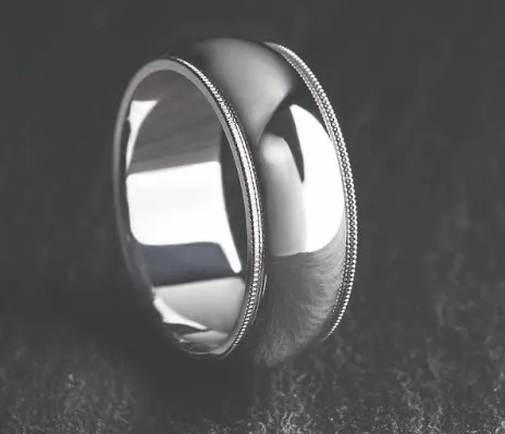Elegant platinum men’s wedding bands on display