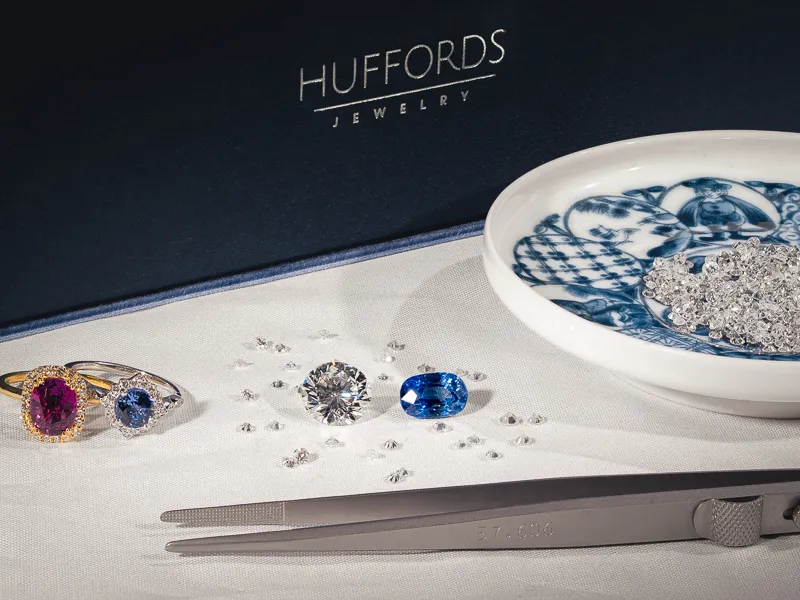 Hand sketching intricate jewelry designs on paper. Learn More.