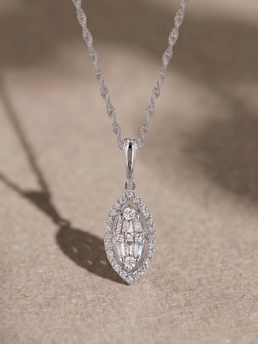 A marquise-shaped diamond pendant with a halo on a twisted silver chain.