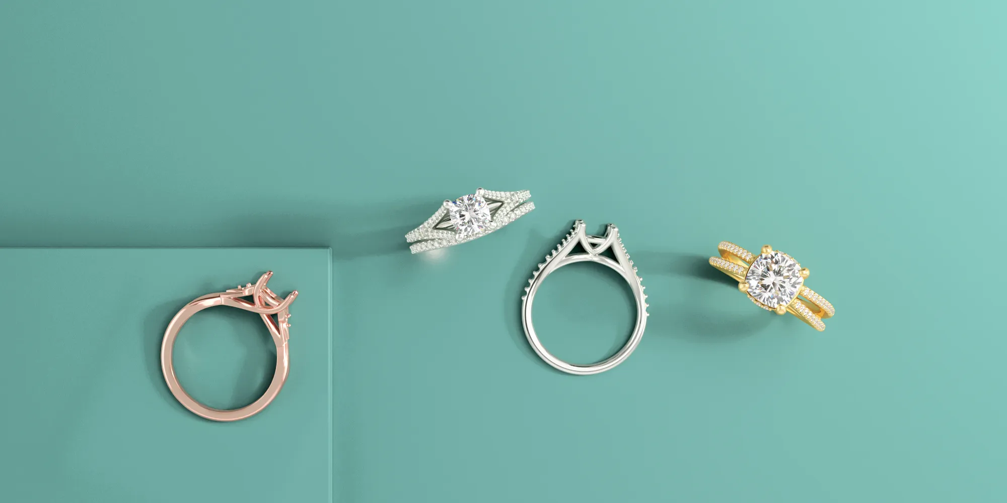 Four elegant engagement rings in different metals on a teal background.