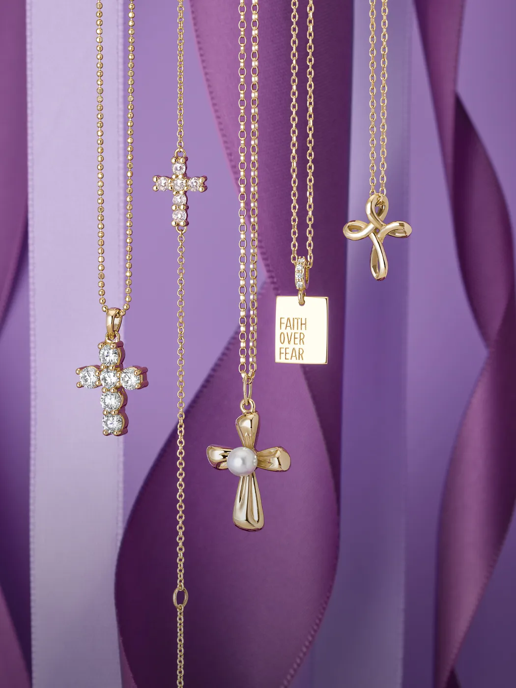Elegant gold necklaces with cross pendants and 