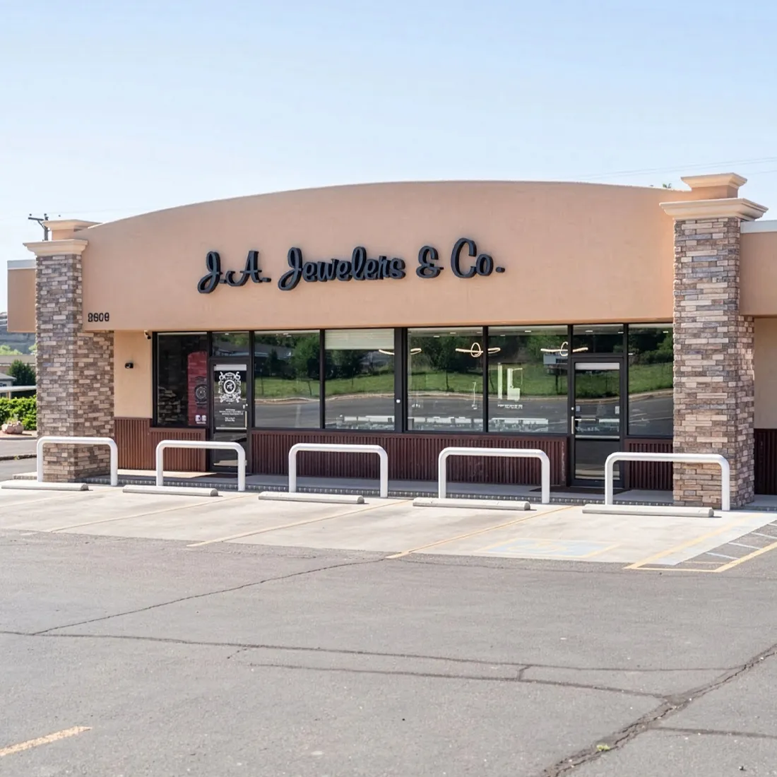 Exterior view of J.A. Jewelers & Co. storefront in Farmington, showcasing the business name and entrance.