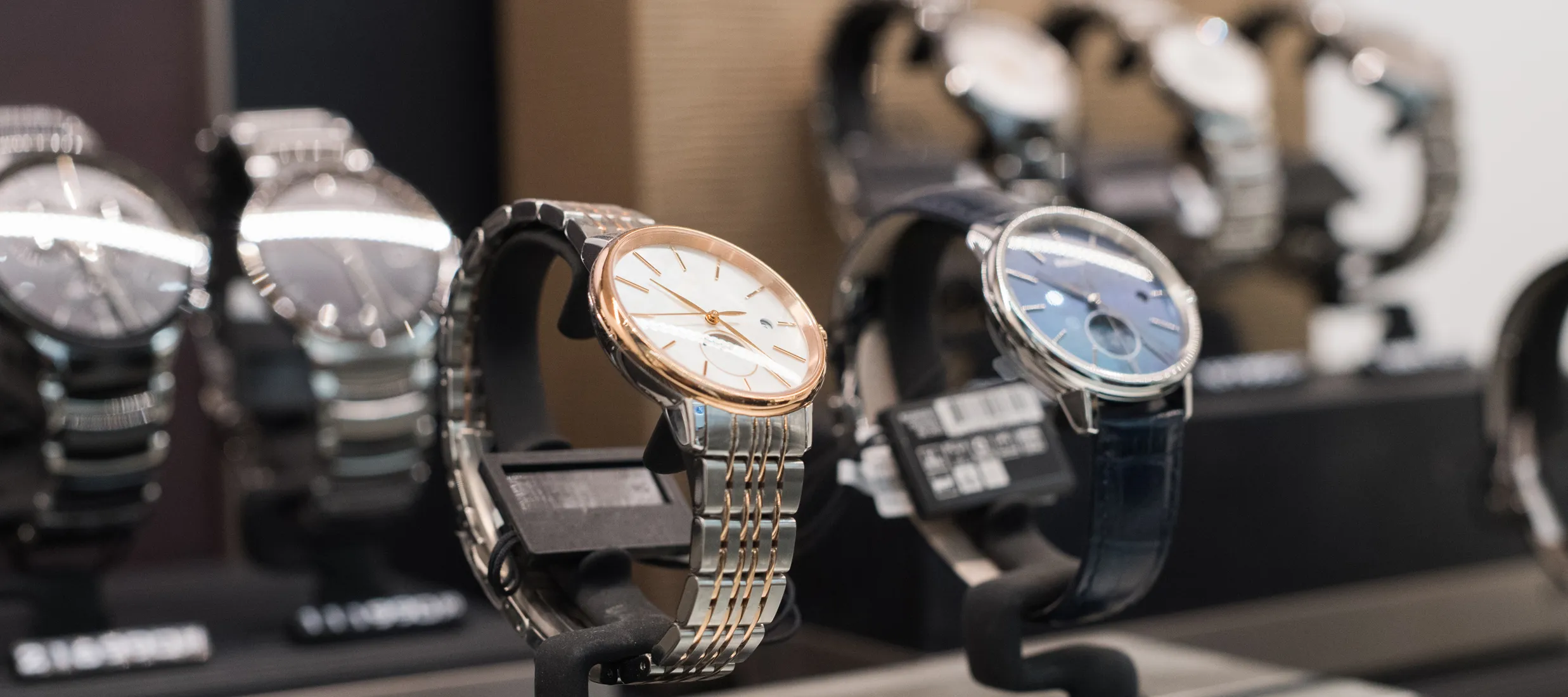 Showroom display of various Citizen watches, showcasing styles and designs available at J.A. Jewelers in Farmington.