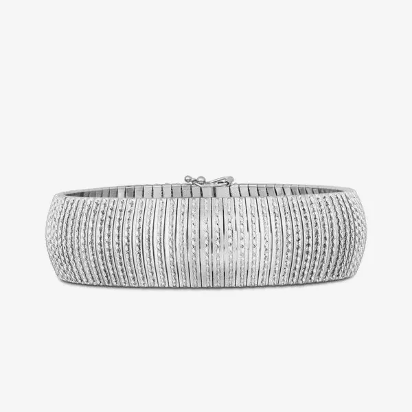 Silver bangle bracelet with textured design. Click to shop bracelets at J. Anthony Jewelers in Neenah.