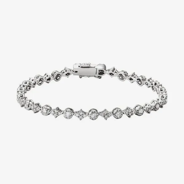Silver bangle bracelet with sparkling diamonds. Click to shop bracelets at J. Anthony Jewelers in Neenah.