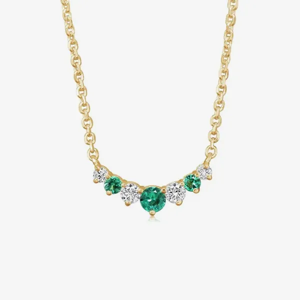 Gold necklace with green and clear gemstones, available at J. Anthony Jewelers. Click to shop pendants & necklaces.