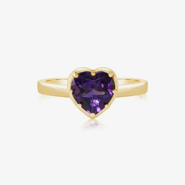 Heart-shaped amethyst ring set in gold. Click to shop rings at J. Anthony Jewelers.