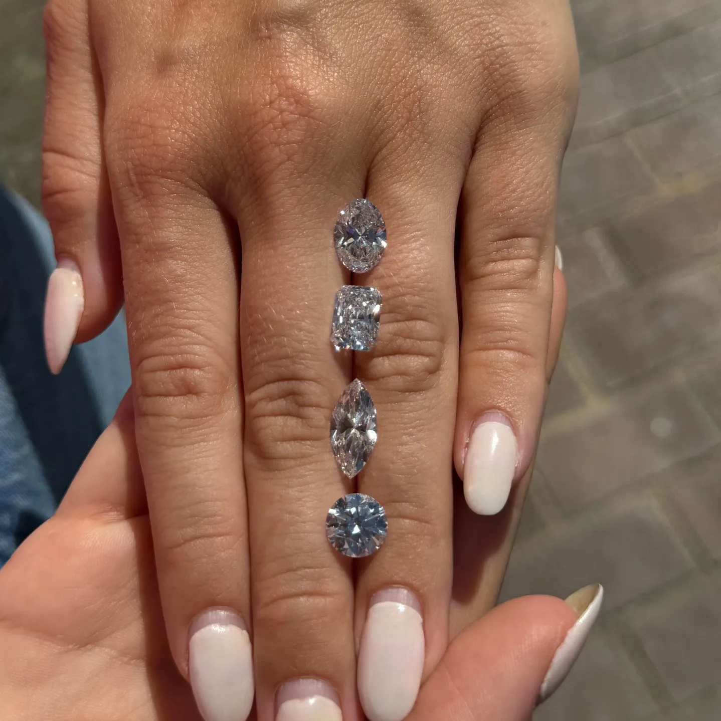 Hand-selecting diamonds in Antwerp Belgium with RJO jewelers