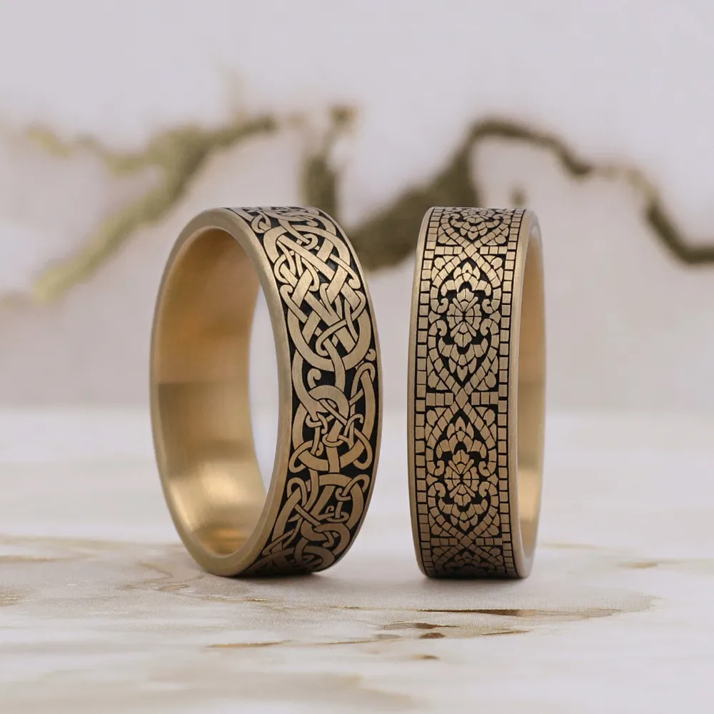 A woman holds a bouquet of tulips, showcasing a diamond engagement ring and a bracelet on her wrist.