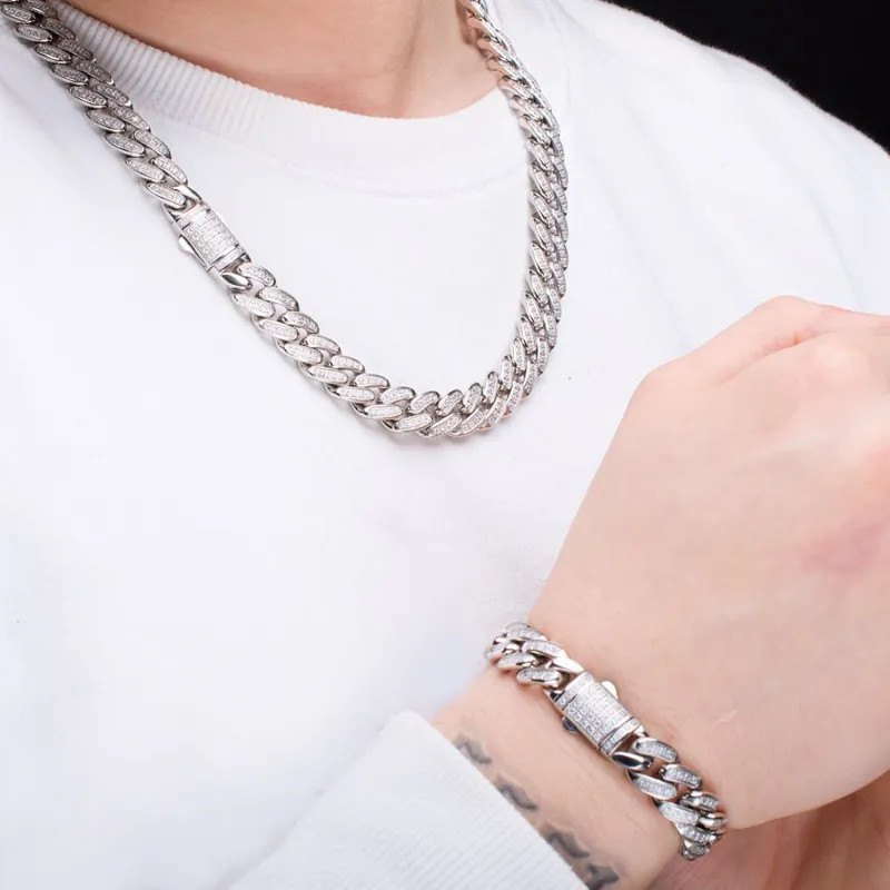 Men's silver chain necklace and bracelet set, showcasing a stylish and bold jewelry design.