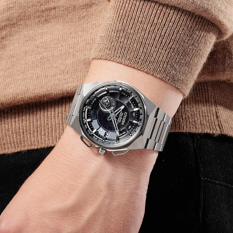 Stylish Citizen watch on a wrist, featuring a black dial and silver stainless steel band.