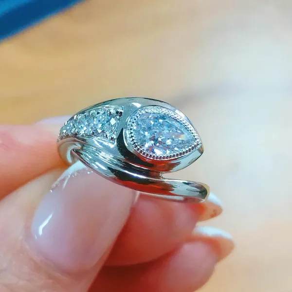 Bypass pear diamond ring