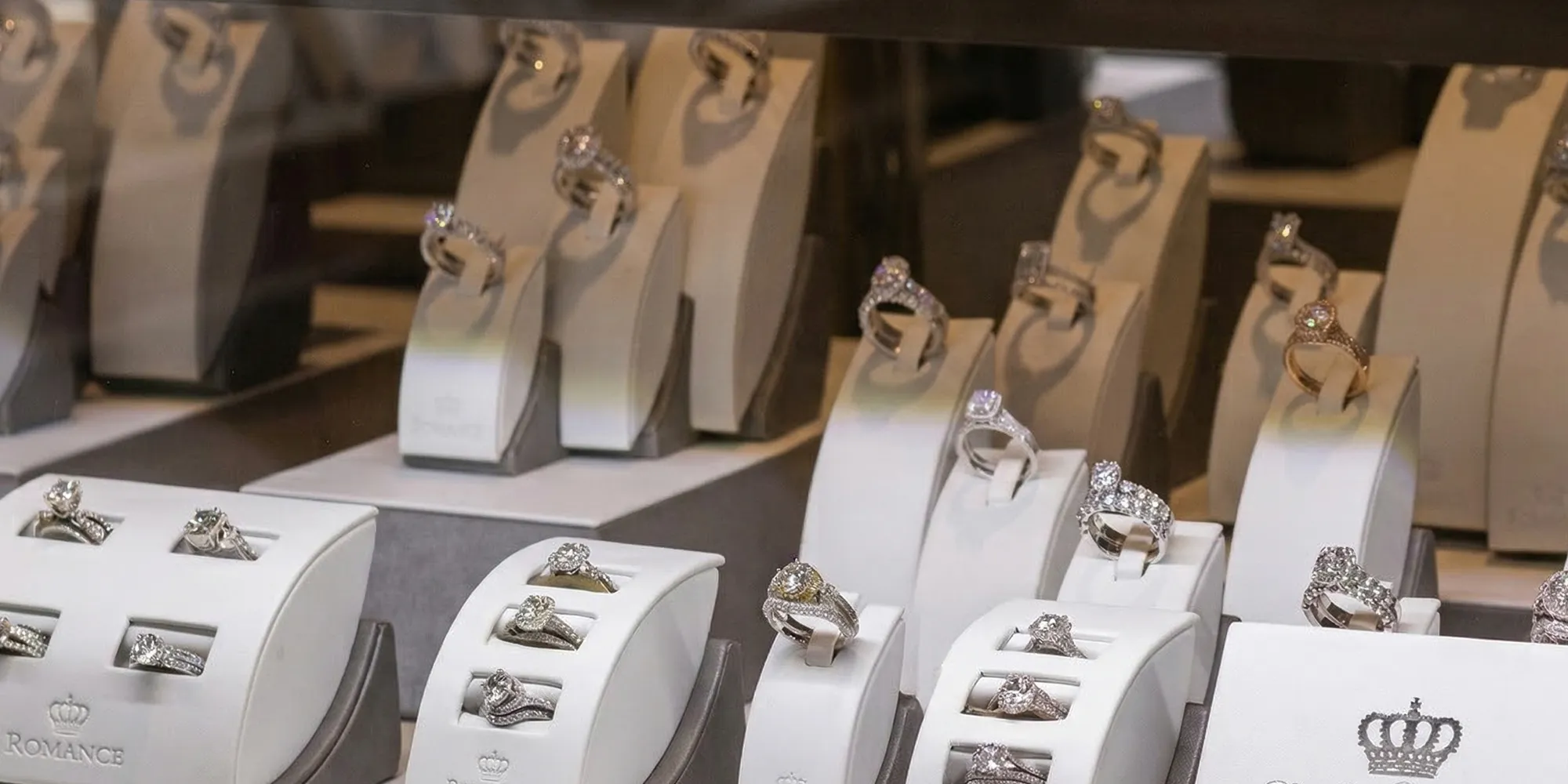 Display of diamond rings on stands at J. Parkerson Jewelers in Starkville.