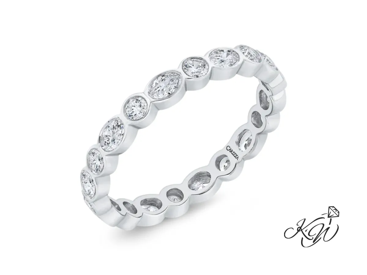 Carizza white gold eternity band with bezel-set diamonds