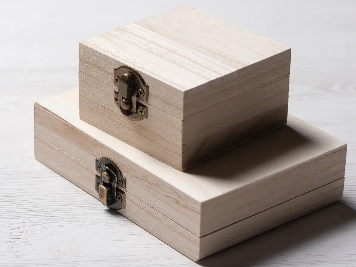 Stacked wooden jewelry storage boxes