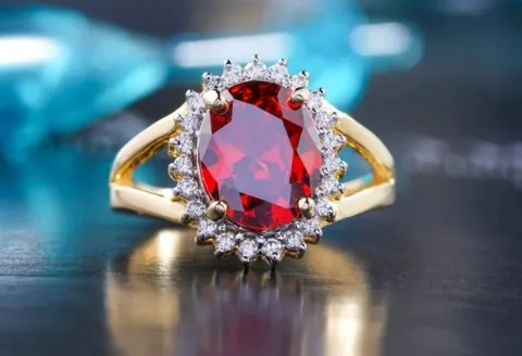 Oval ruby ring with diamonds