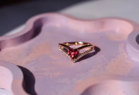 Heart-shaped ruby and diamond V-ring