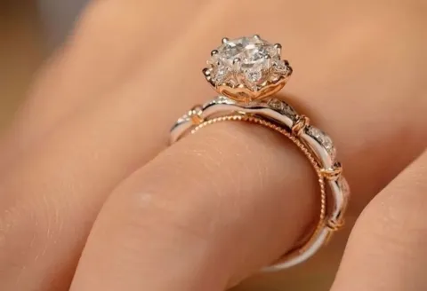 Custom engagement ring with gold accents.