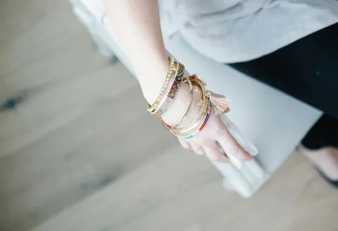 Layered bangle stack this season for fashion