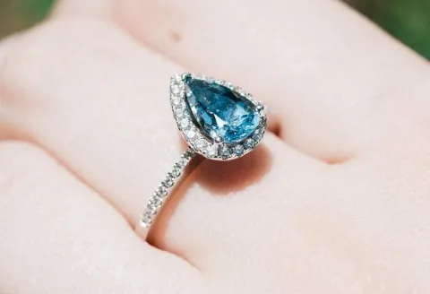 Unique topaz engagement ring with a pear-shaped design