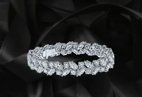 Simple gold bangle bracelet with diamond