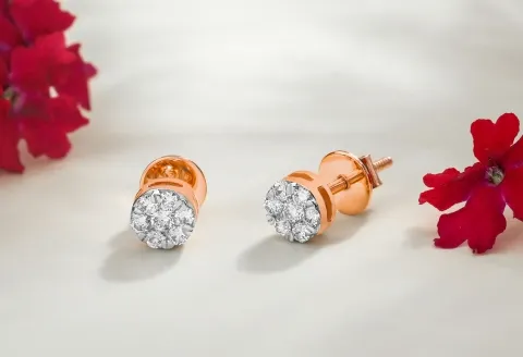 Rose gold Diamond Earrings on display