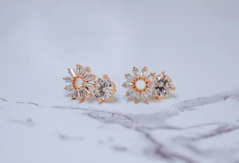 Diamond earrings shown with clasp details