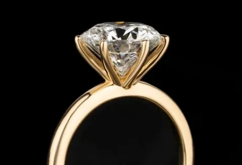Gold solitaire diamond engagement ring