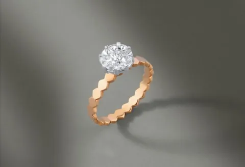 Rose gold engagement ring with round diamond