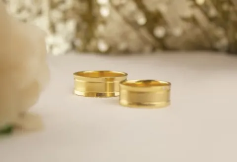 Polished gold men's wedding band set