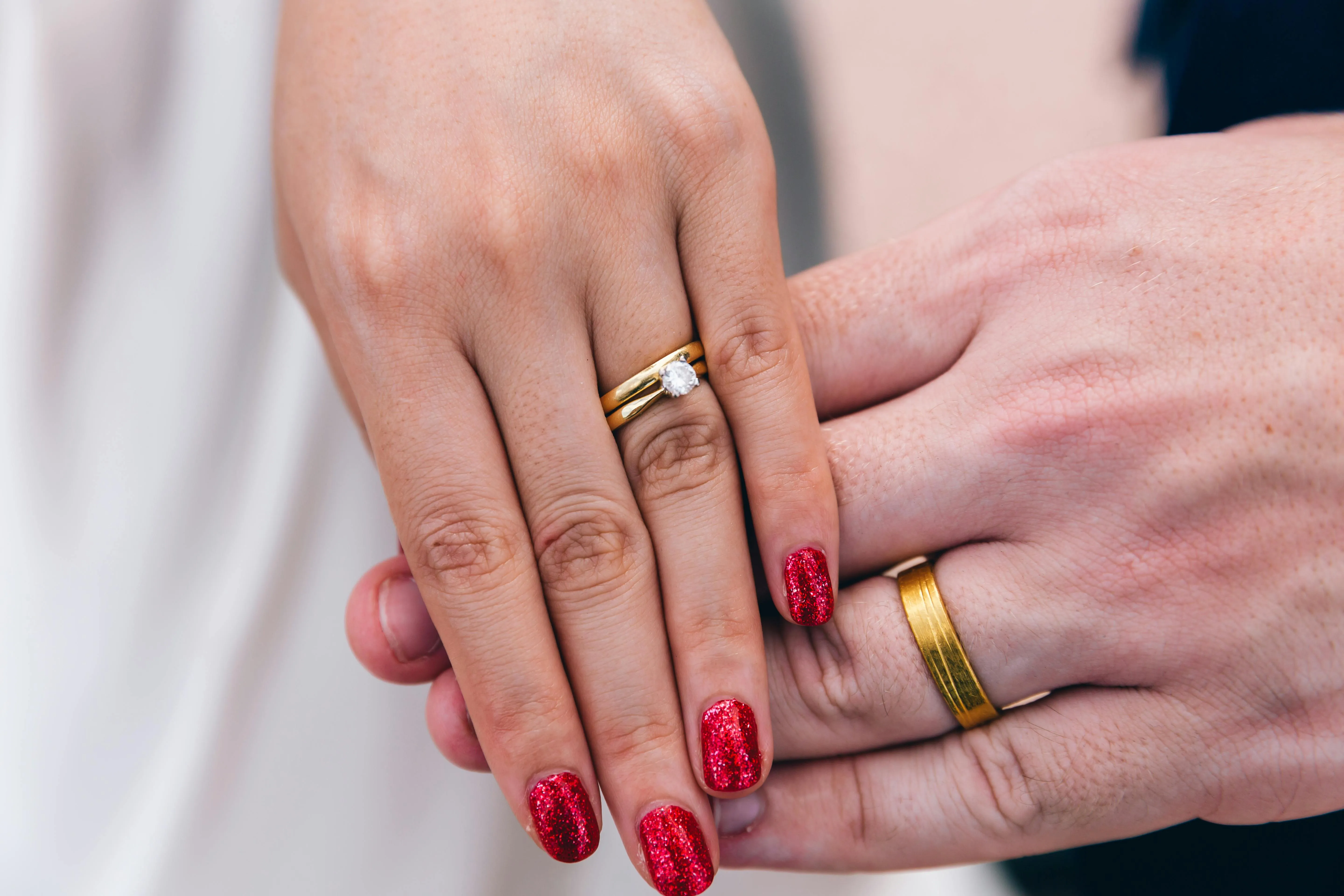 Coordinated wedding band and engagement ring on hand